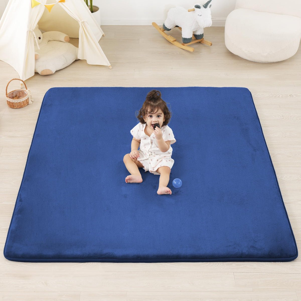 PaPaMat 1.3-inch thick blue front view, cushioned surface ideal for tummy time