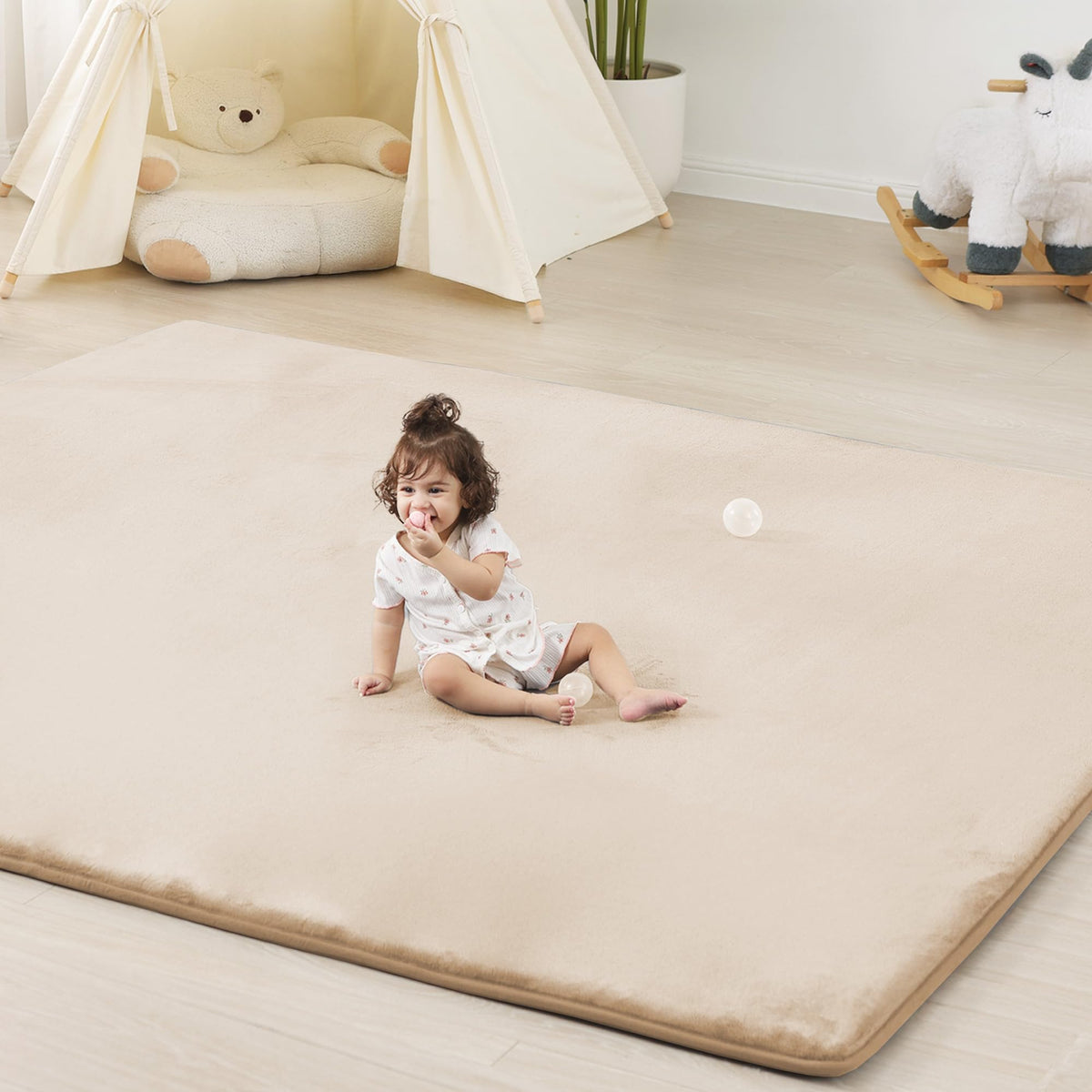 PaPaMat beige 1.3-inch thick play mat ideal for tummy time and safe crawling.