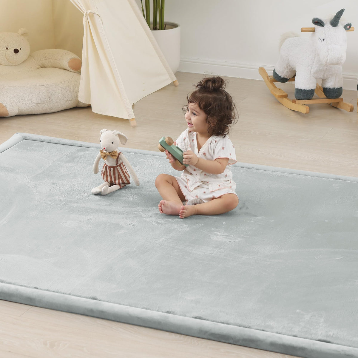 PaPaMat 1-5 inch thick baby play mat laid flat for tummy time comfort.