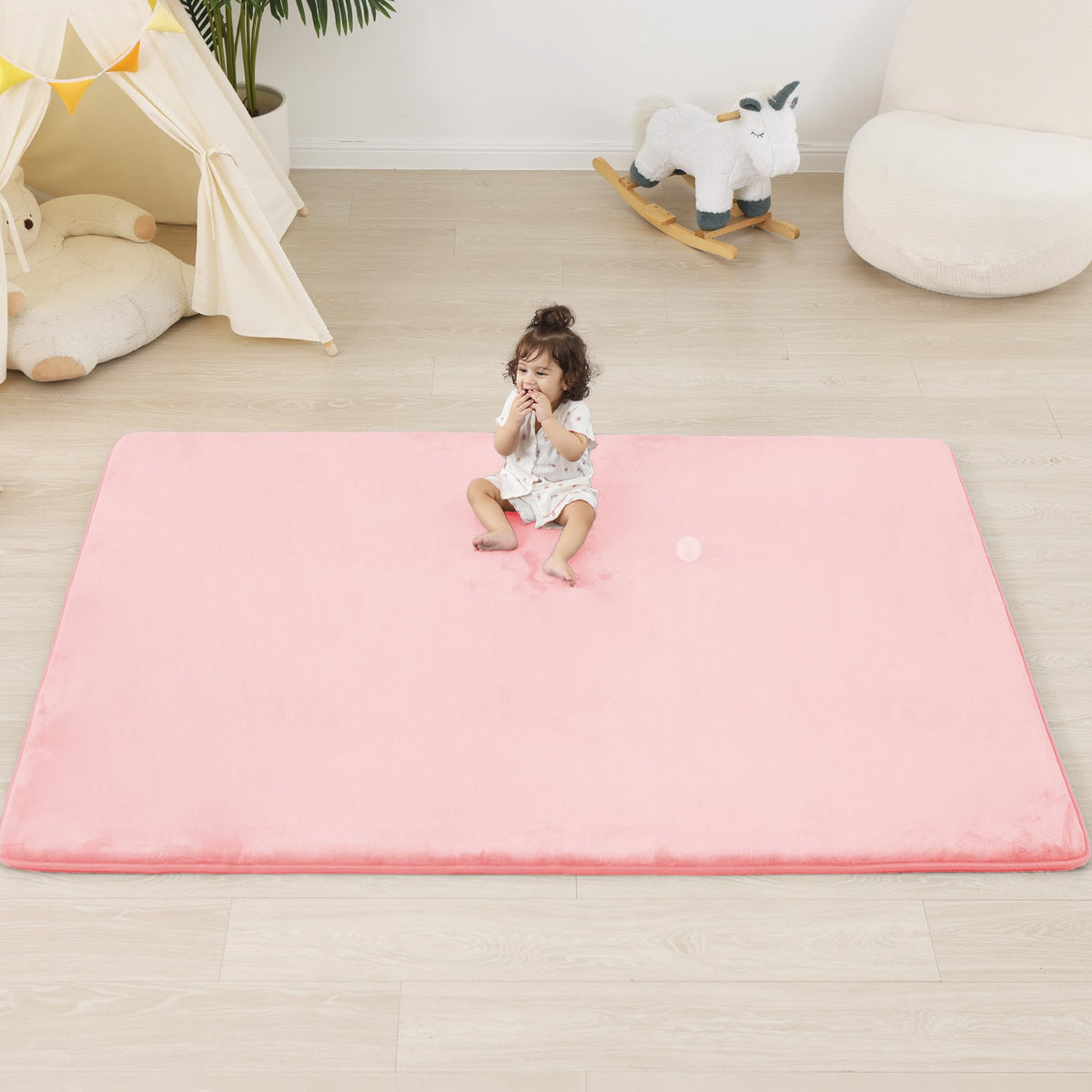 PaPaMat 1.3-inch thick pink play mat showing plush cushioning for tummy time
