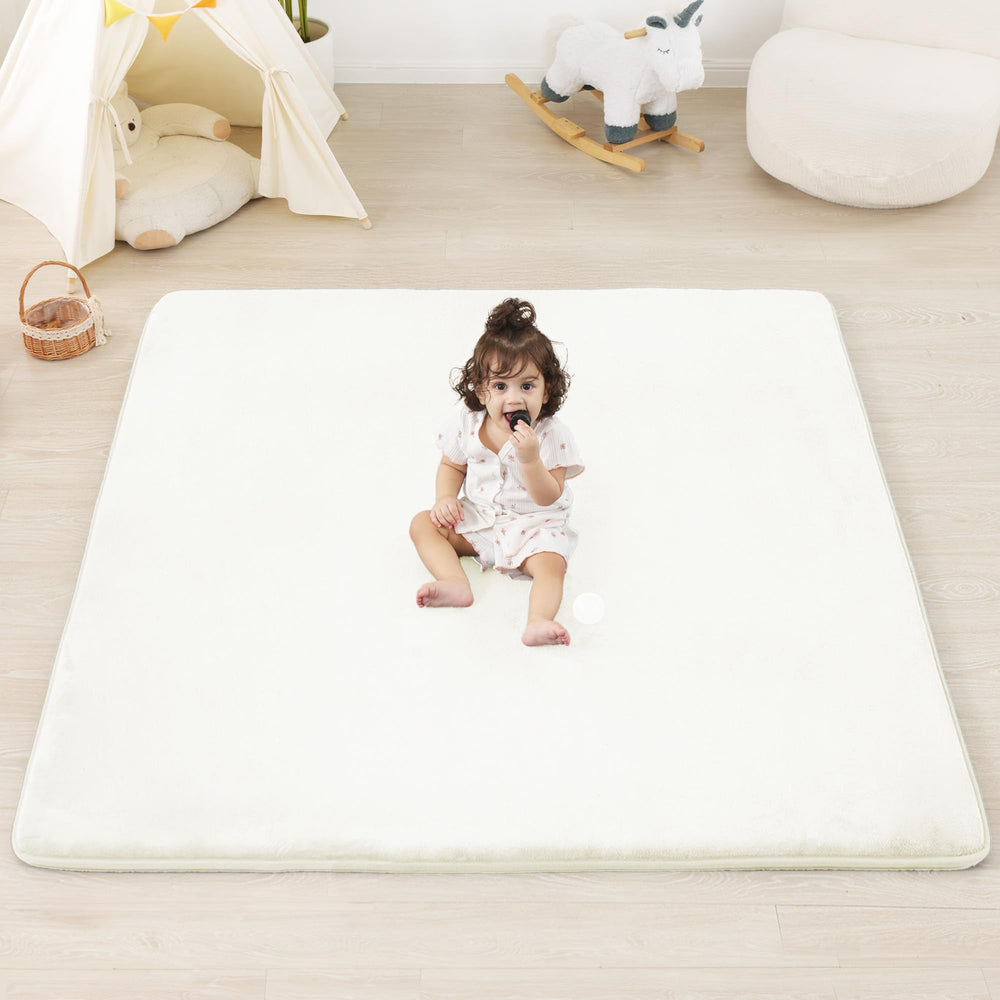 PaPaMat ivory baby play mat on the floor for tummy time and crawling