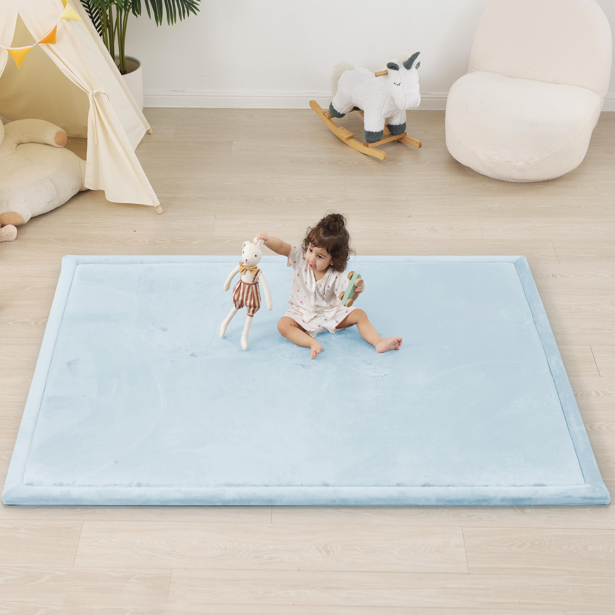 PaPaMat baby tummy time and crawling use on a blue play mat.