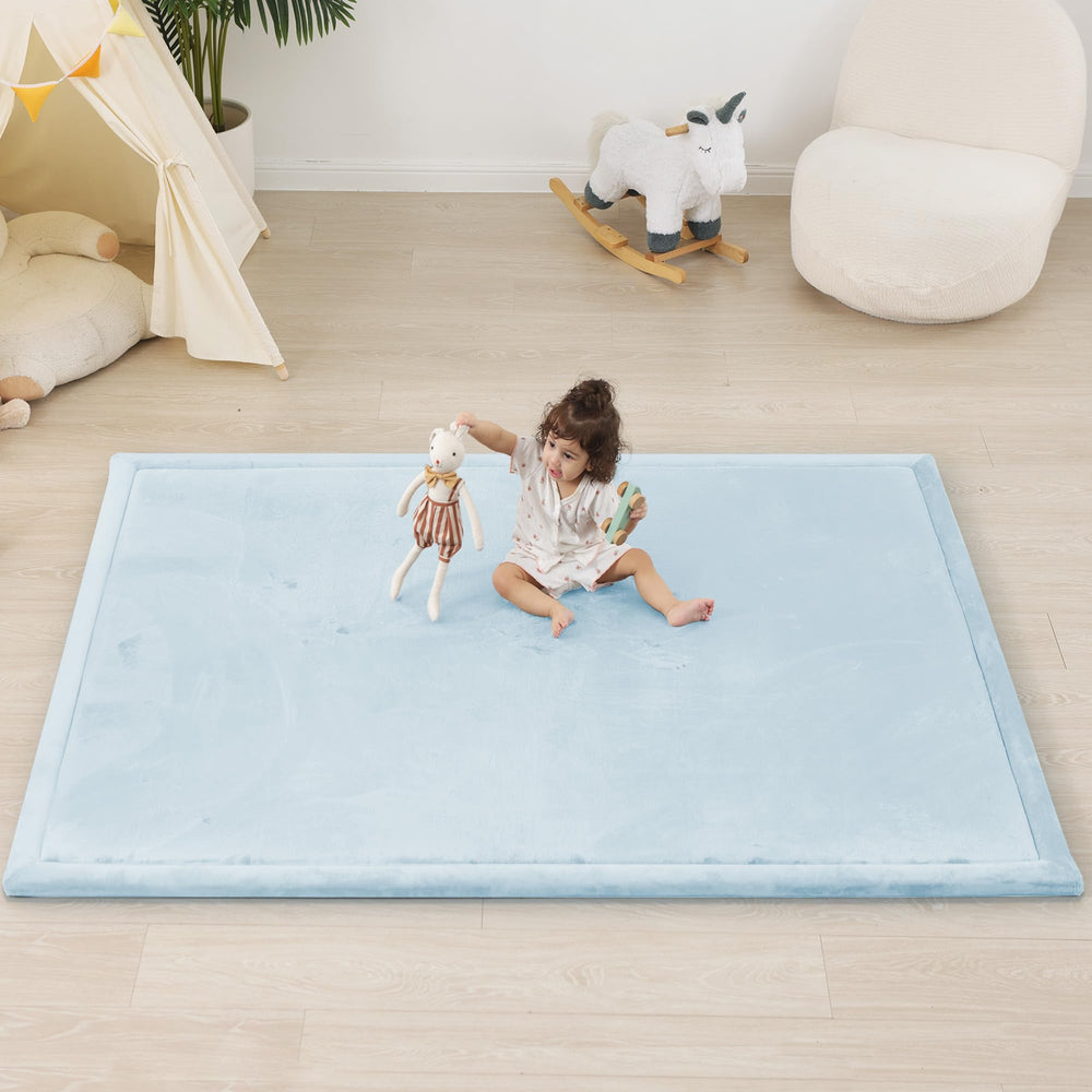 PaPaMat baby tummy time and crawling use on a blue play mat.