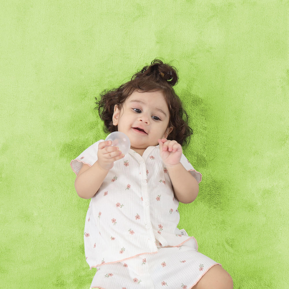 PaPaMat cushioned support supports tummy time, crawling, and gentle standing