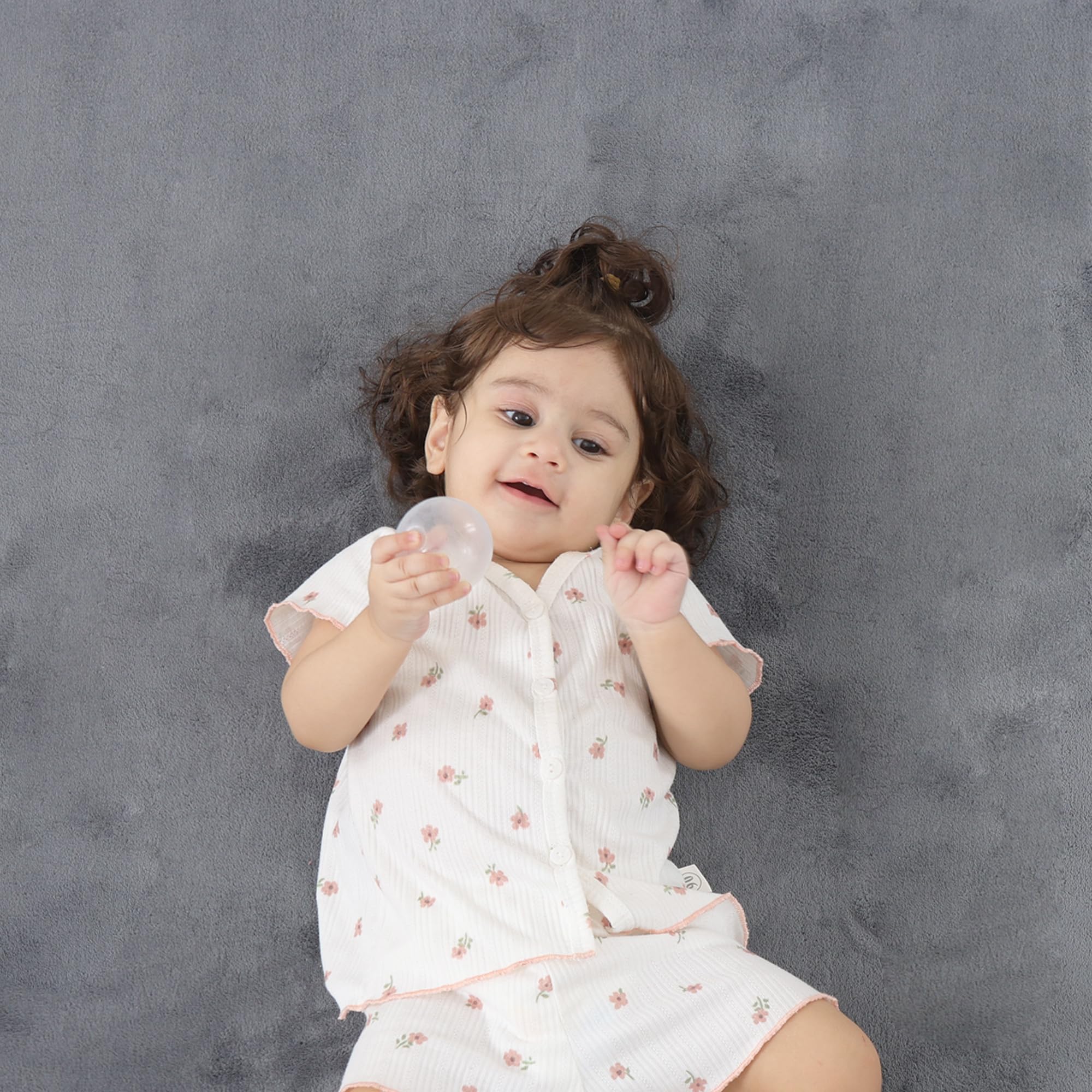 PaPaMat large surface supports babies, toddlers, and family play
