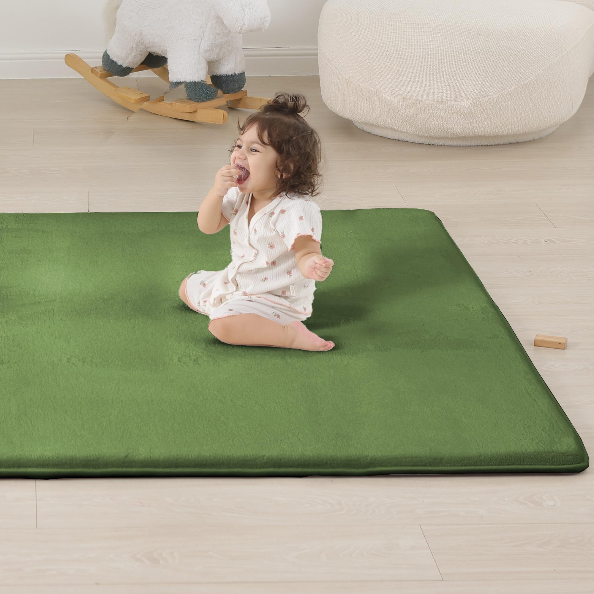PaPaMat versatile mat doubles as tummy-time and crawl mat across rooms.