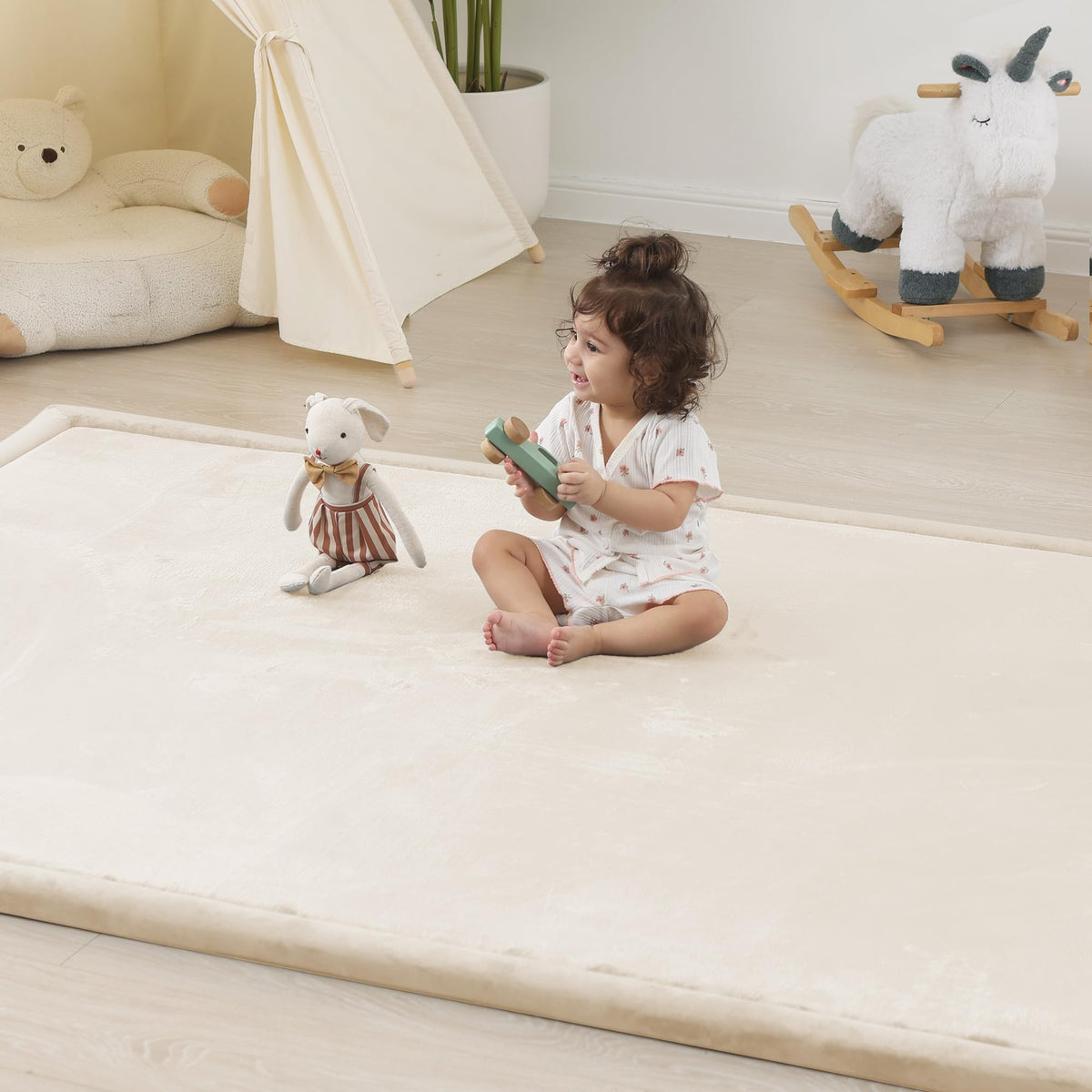 PaPaMat one-and-half-inch memory foam baby play mat offers cushioned tummy time on floors.