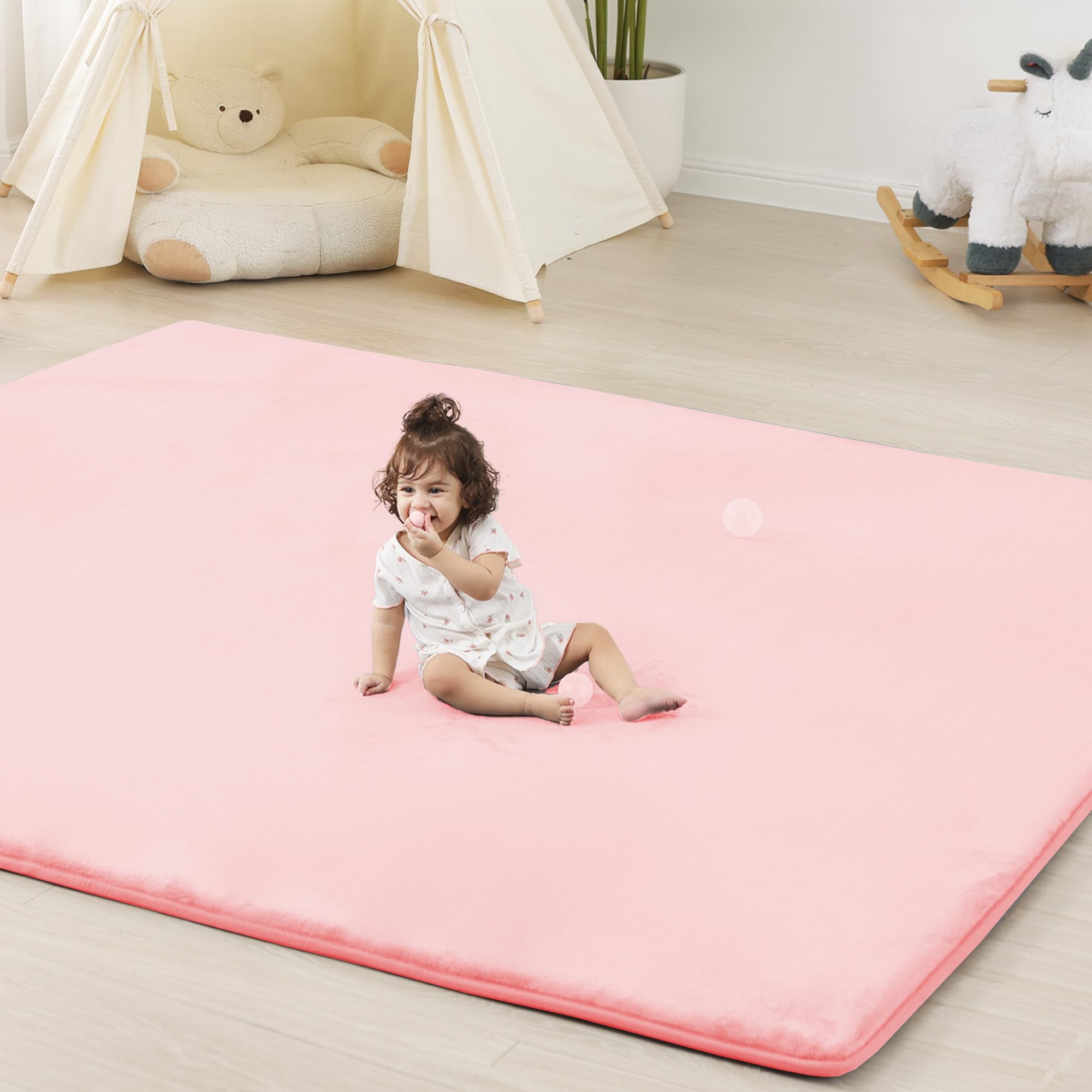 PaPaMat pink 1.3-inch thick foam mat for cushioned crawling and tummy time.