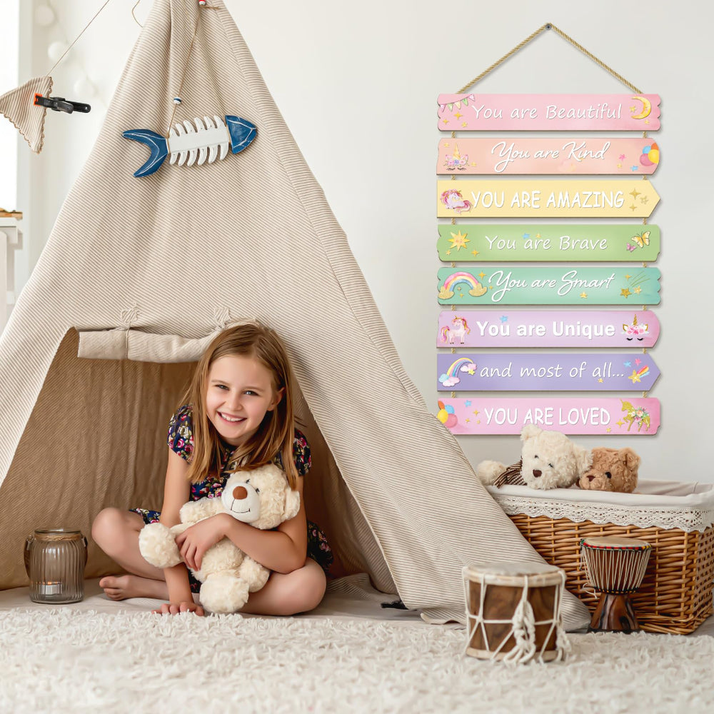 Paquesta girl room wall sign adds whimsy to a cozy space.