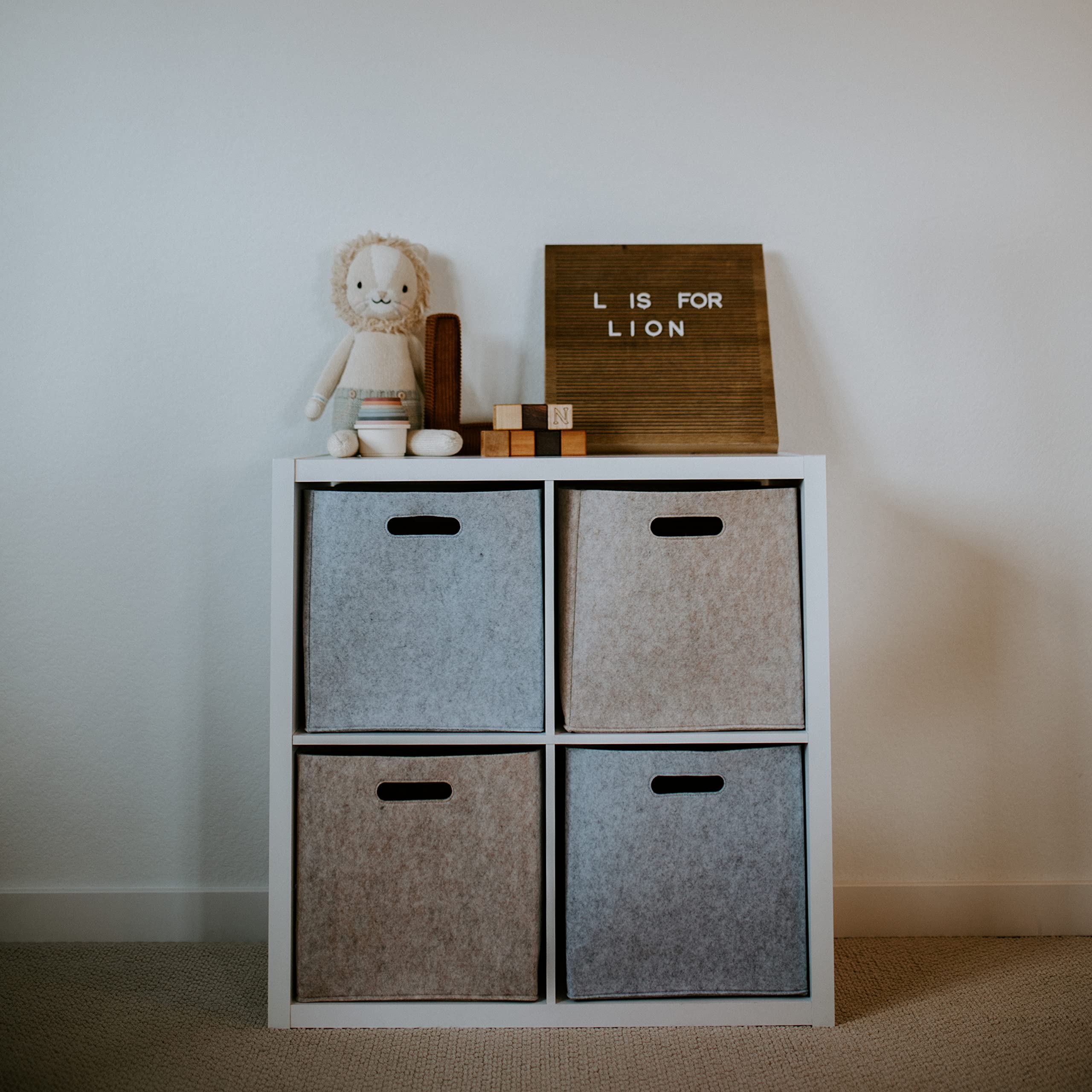 Parker Baby Co. 11-inch gray cube helps keep nursery tidy.