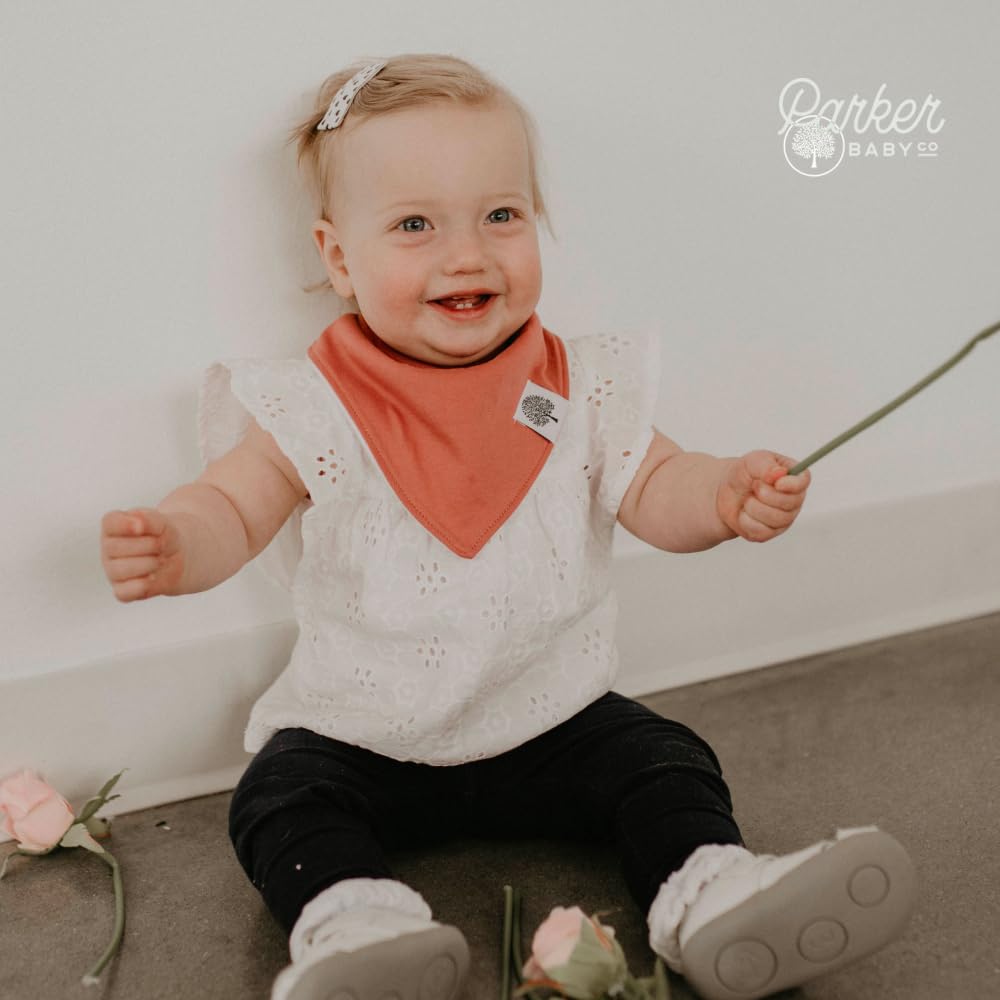 Parker Baby Co. easy-clean bibs resist mess and wipe clean.