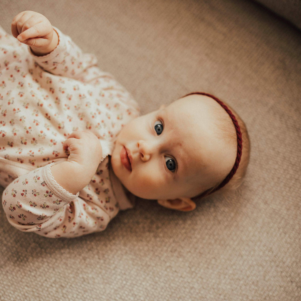 Parker Baby Co. marigold headbands capture sunny vibes in family photos.