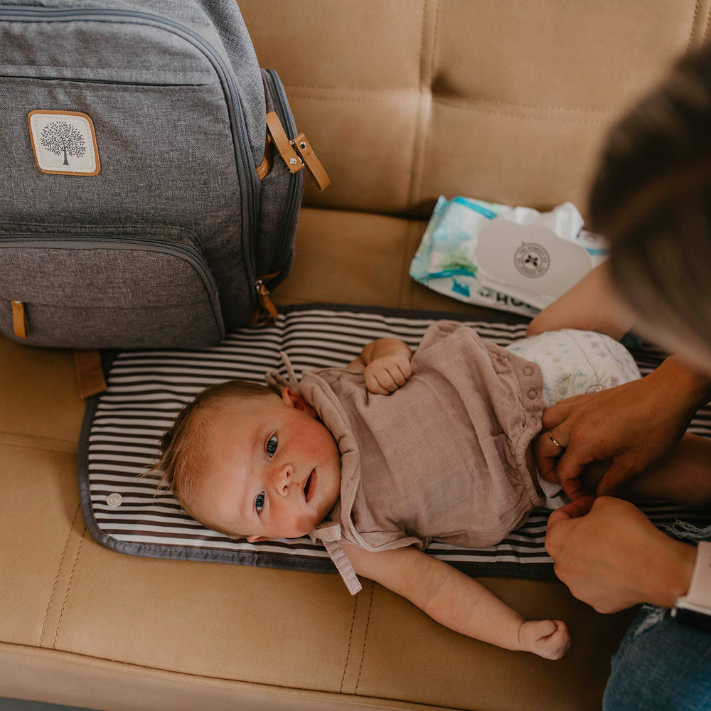 Parker Baby Co changing pad in a cozy nursery setup