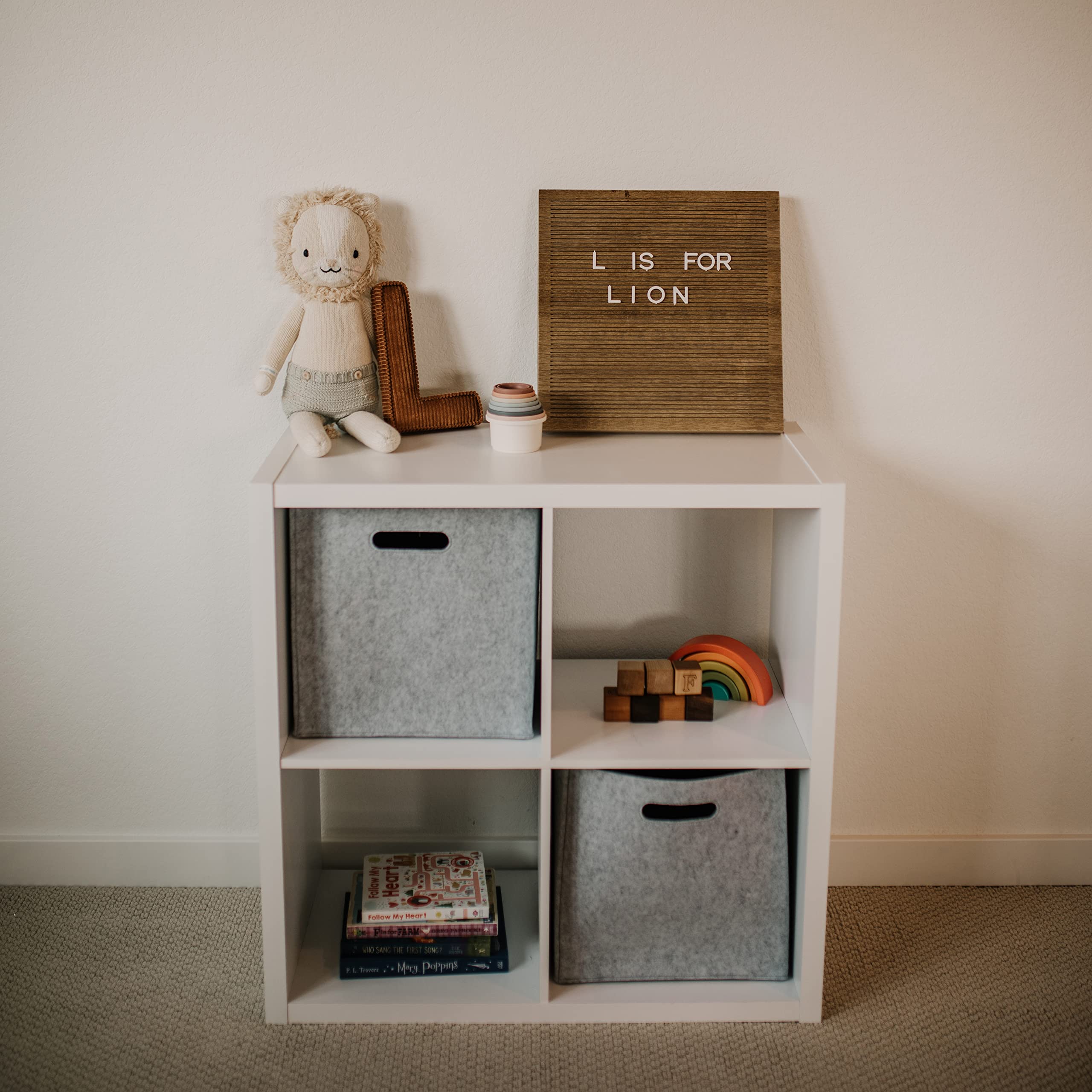 Parker Baby Co. gray cube in living space supports tidy organization.
