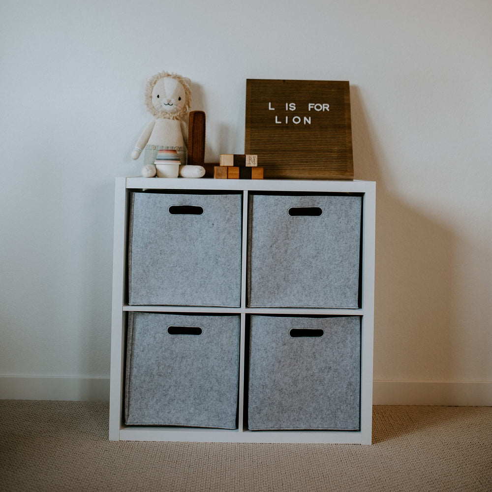 Parker Baby Co. collapsible storage cube in gray saves space.