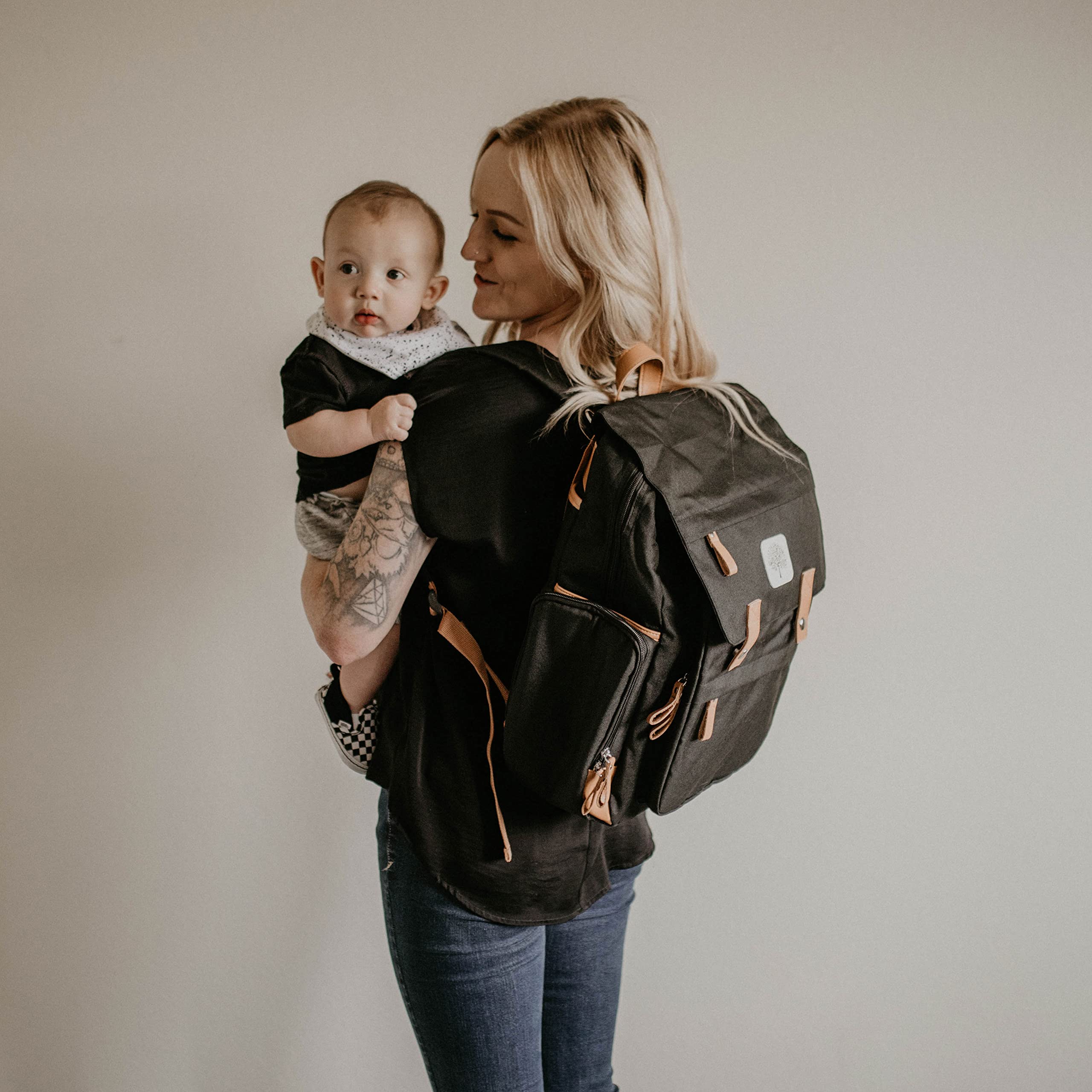Parker Baby Co. changing pad tucked in back sleeve offers quick, clean diaper changes.