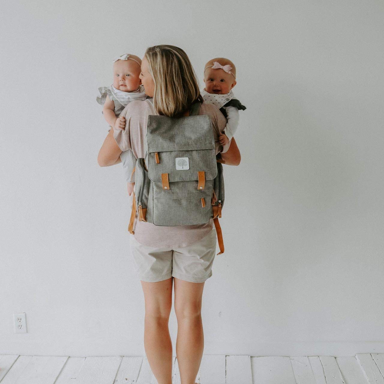 Parker Baby Co. diaper backpack organized interior with mesh pockets for diapers and wipes