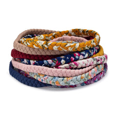 Parker Baby Co. marigold floral braided headband keeps hair tidy during play