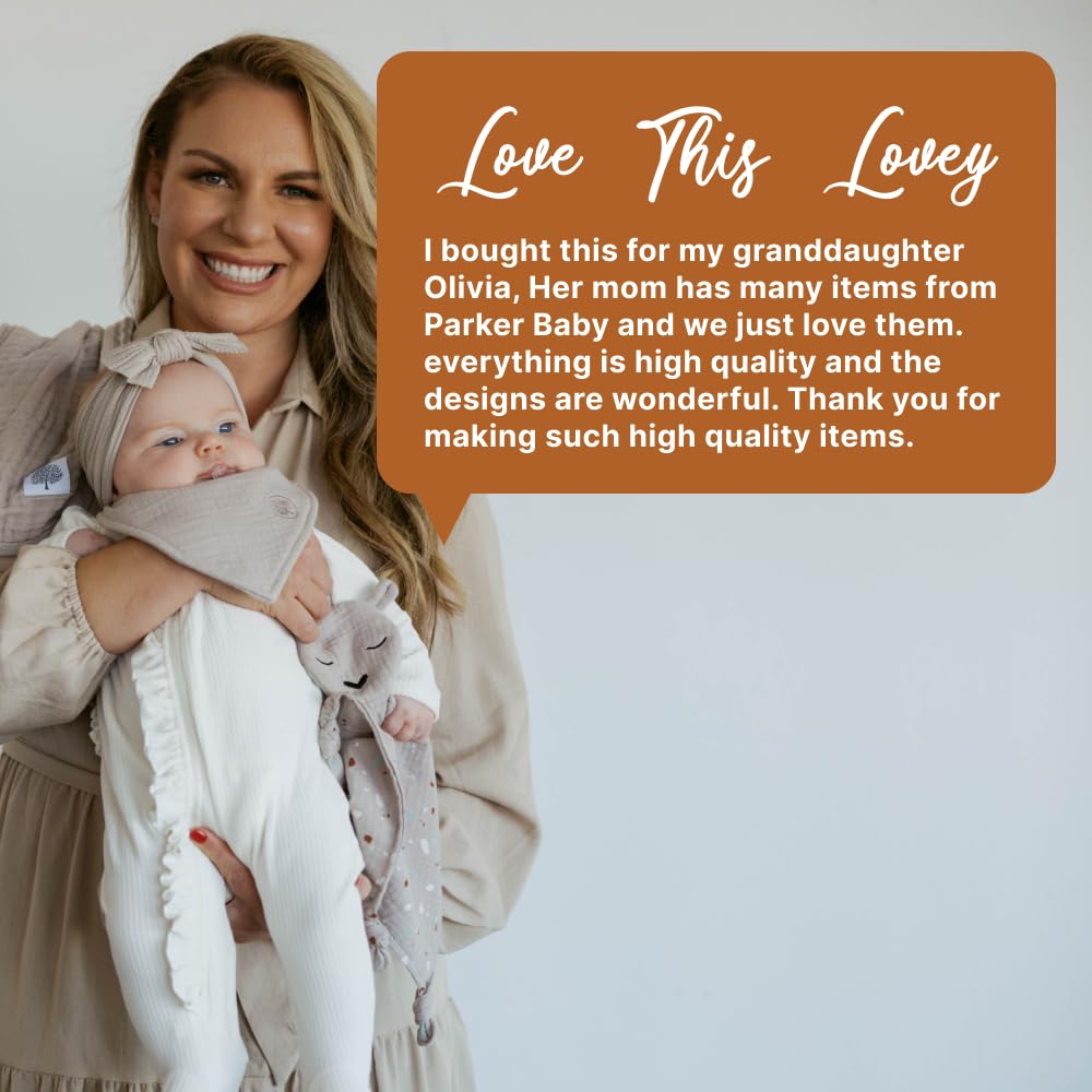 Newborn snuggle with Parker Baby Co. lovey for gentle comfort and security.