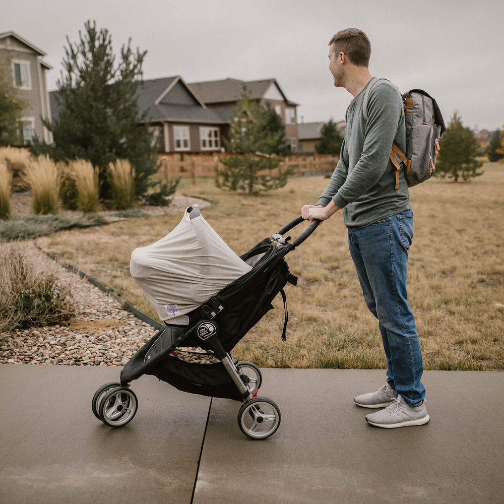 Parker Baby Co Pine versatile 4-in-1 cover, a practical gift option.