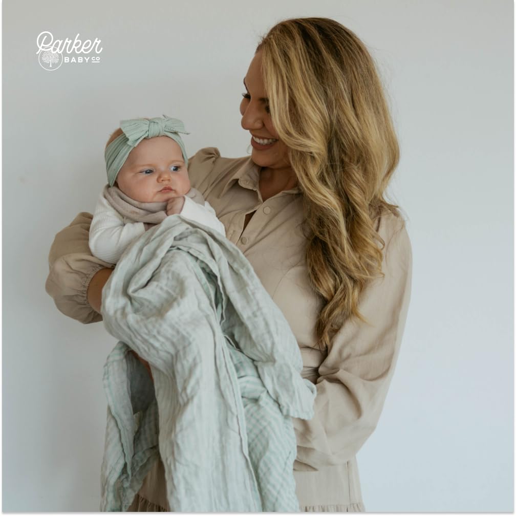 Parker Baby Co sage muslin blanket used as tummy time mat