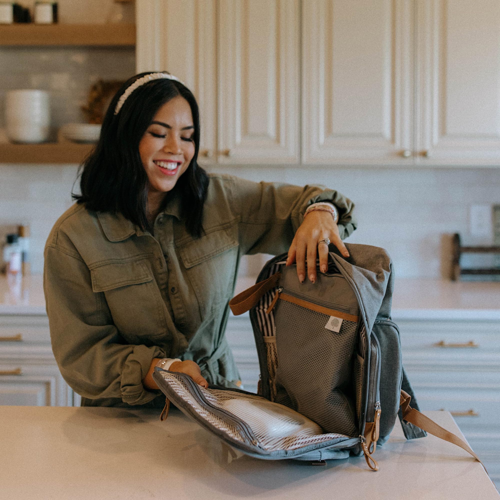 Parker Baby Co mesh outer pocket provides airflow for dry items