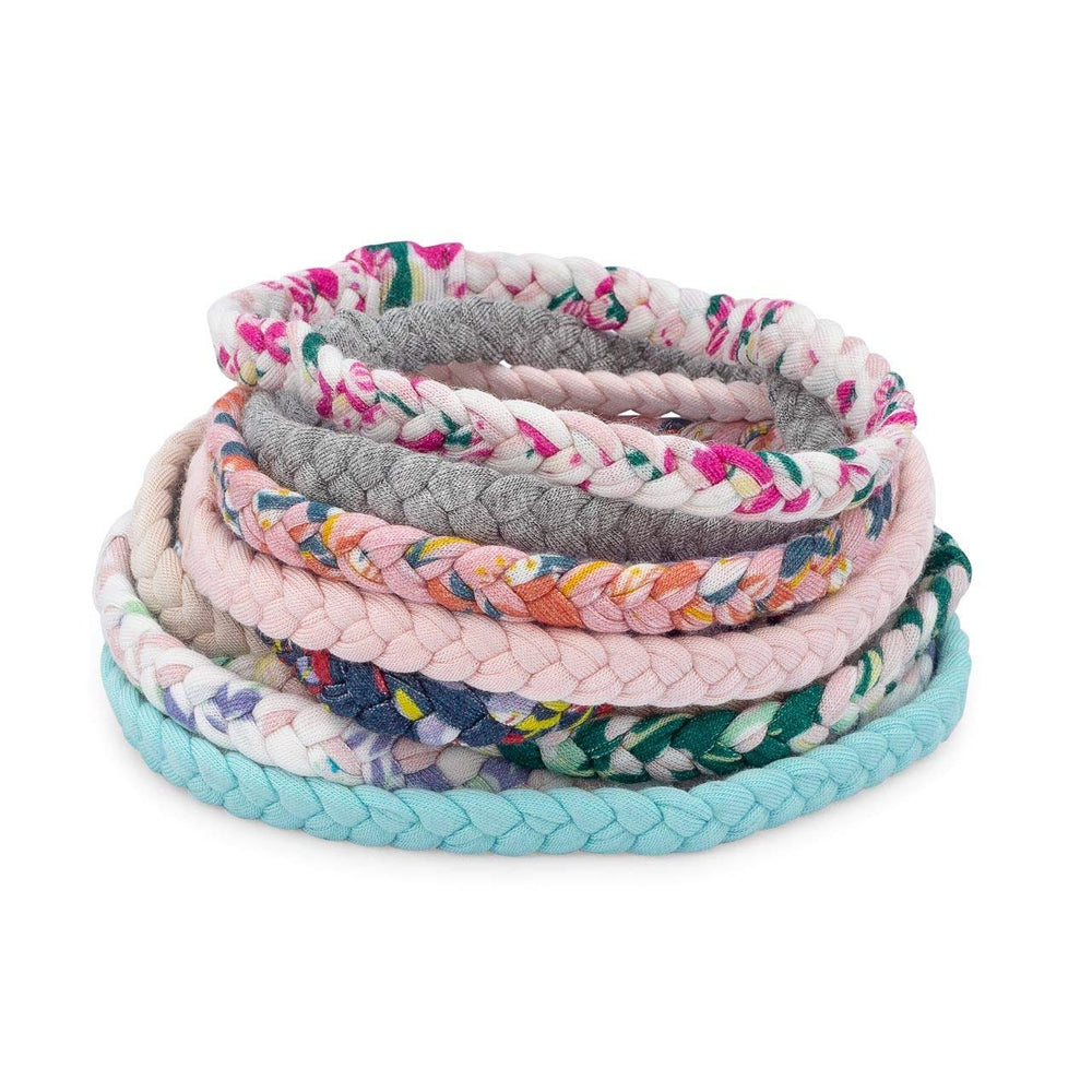 Parker Baby Co. Wildflower headbands in soft pink for newborn outfits and photos.