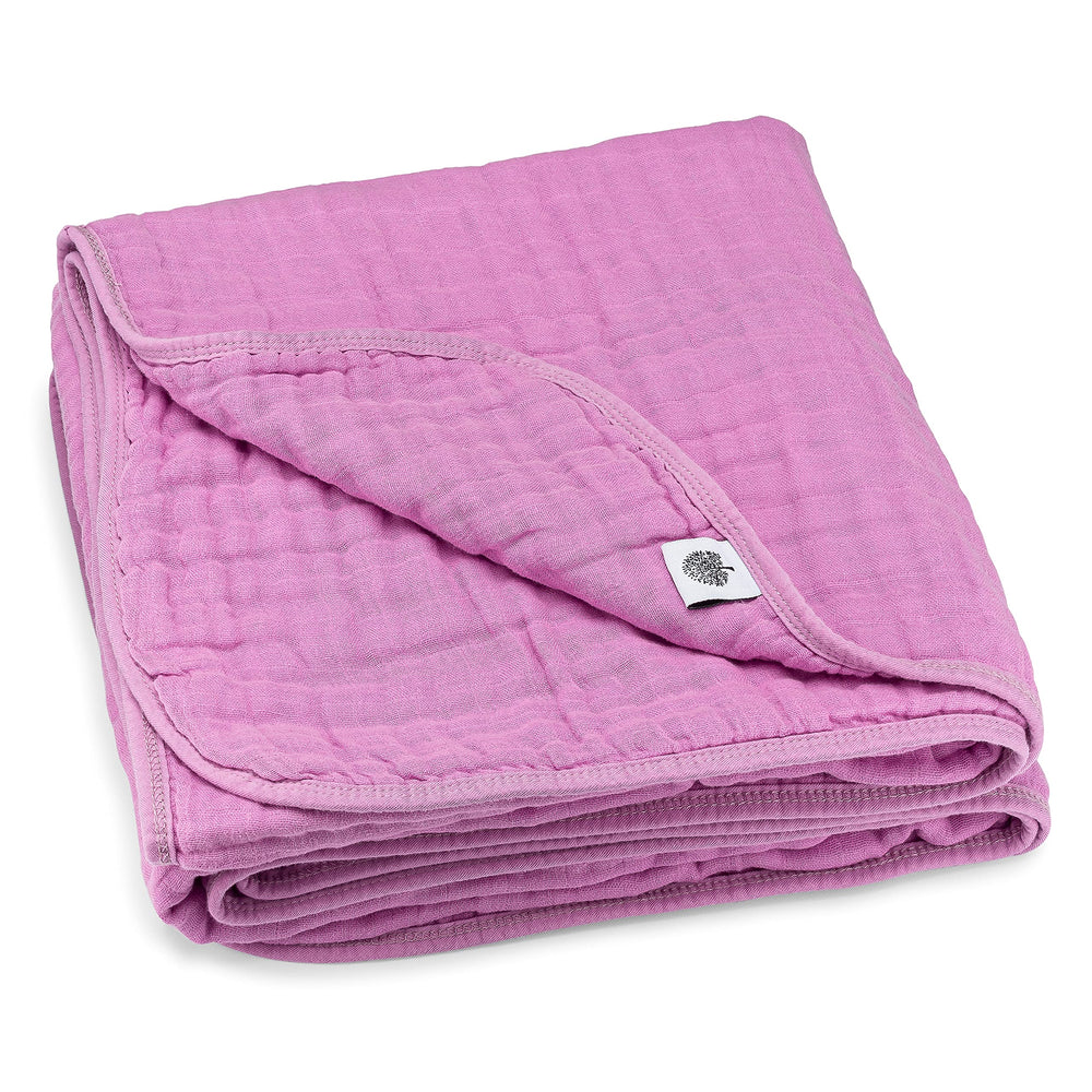 Parker Baby Co. muslin blanket fold closeup highlights ultra-soft fabric.