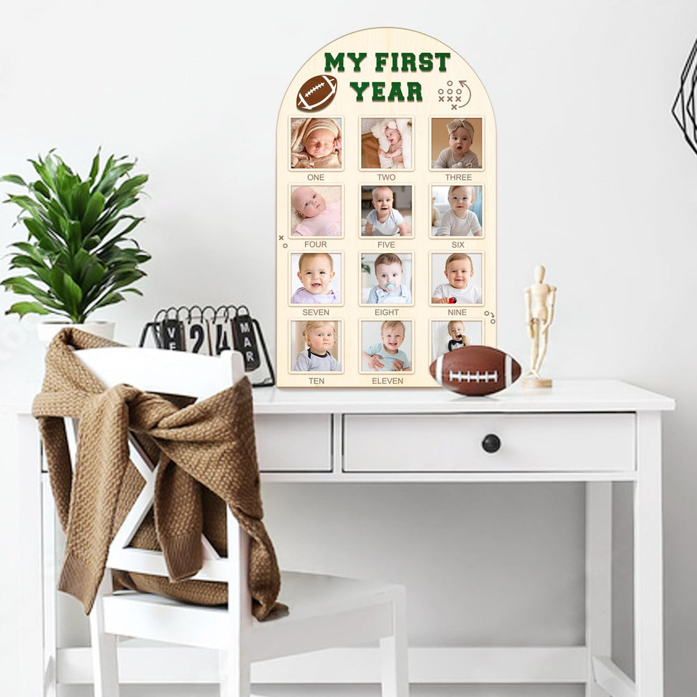 Partico My First Year Photo Board on a desk or shelf suits nursery decor.