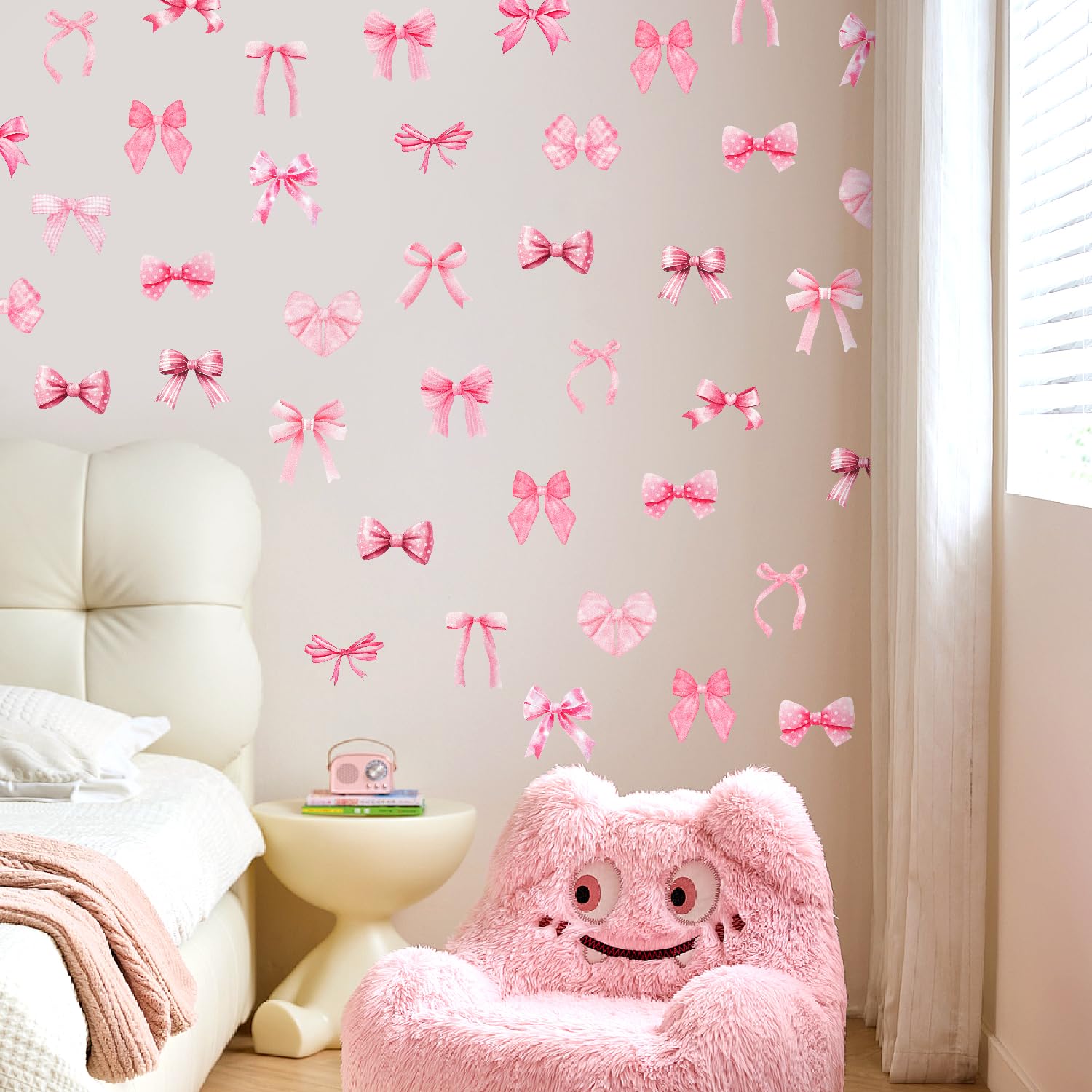Pasonly pink watercolor bow wall sticker cheers up party spaces with girly charm.