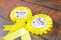 PATICARRY soft silk ribbon badge with black foil font adds premium detail.