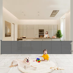 Pawtners Upgrade 120-inch retractable gate extended across a wide doorway for open space use.