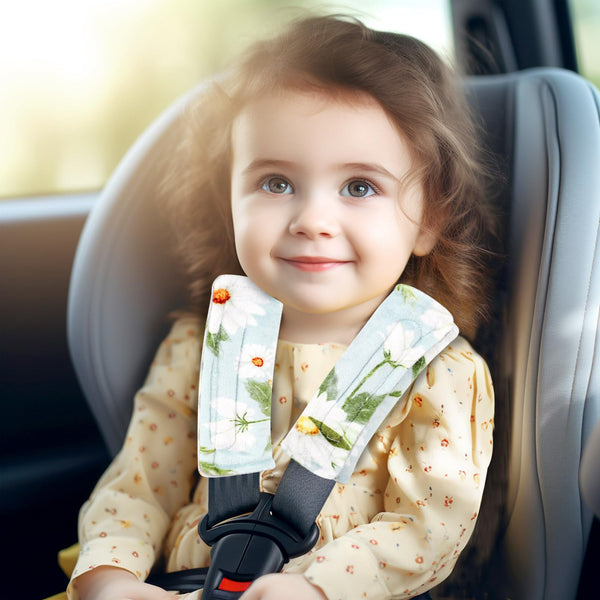 Pea Pod Daisy car seat strap cover front view, soft Minky fabric cushions delicate skin