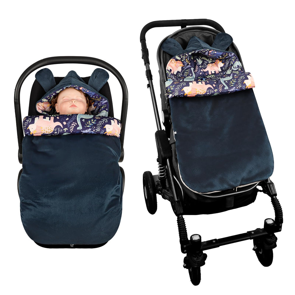 Pea Pod dinosaur stroller footmuff keeps baby warm on outdoor winter walks.