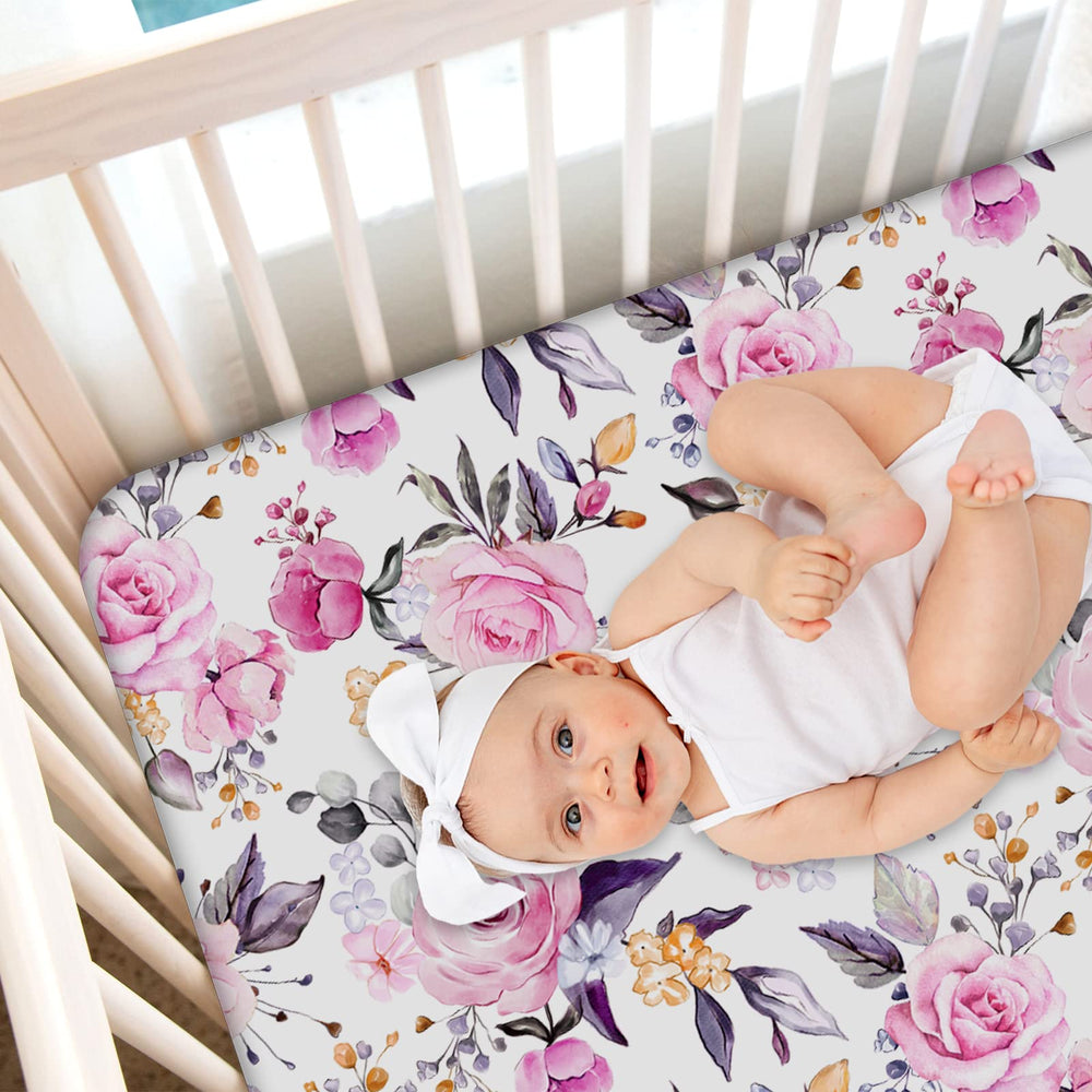 Pea Pod floral crib sheet with elastic edge demonstrates a secure, snug fit.