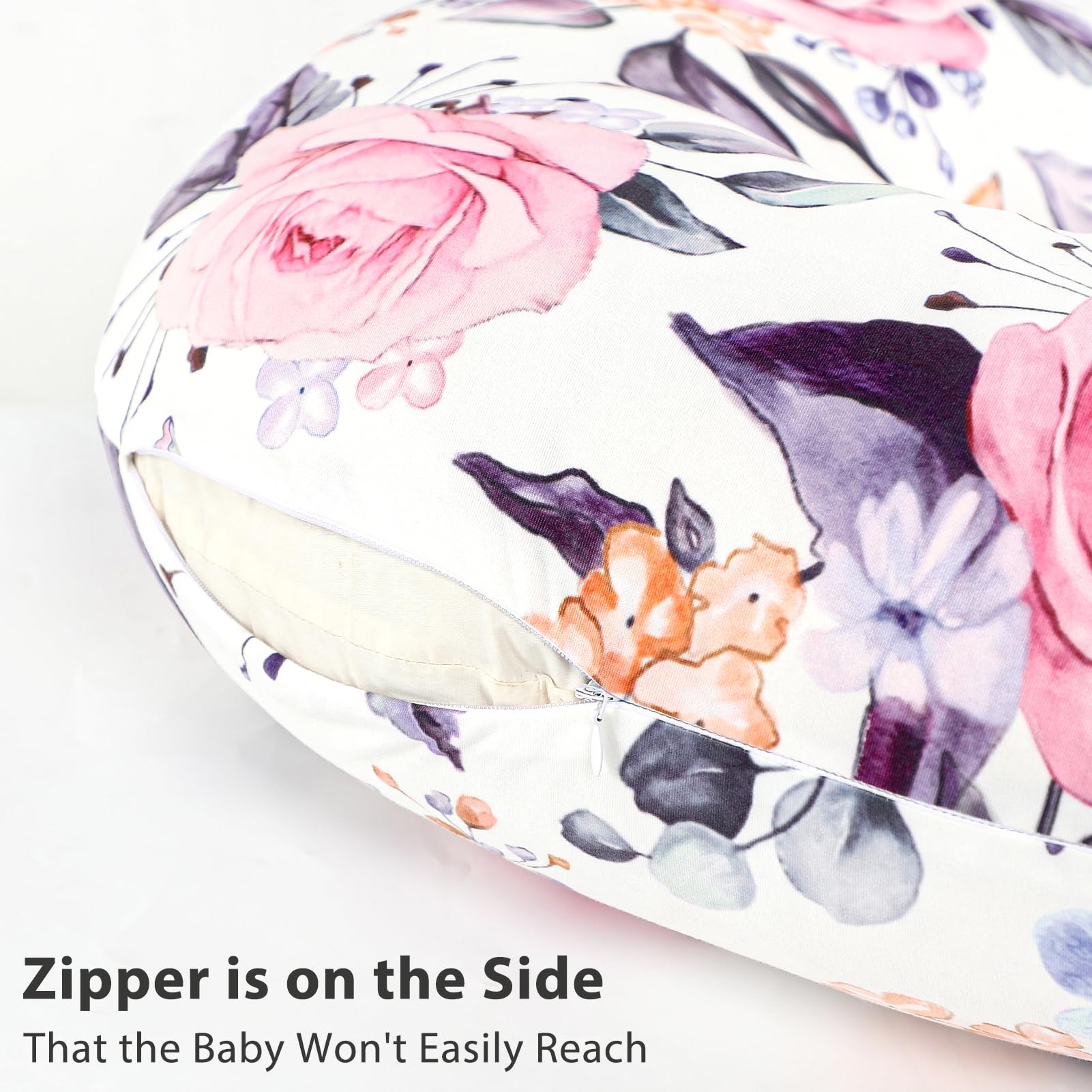 Pink floral pattern on Pea Pod cover adds stylish touch to baby feeding.
