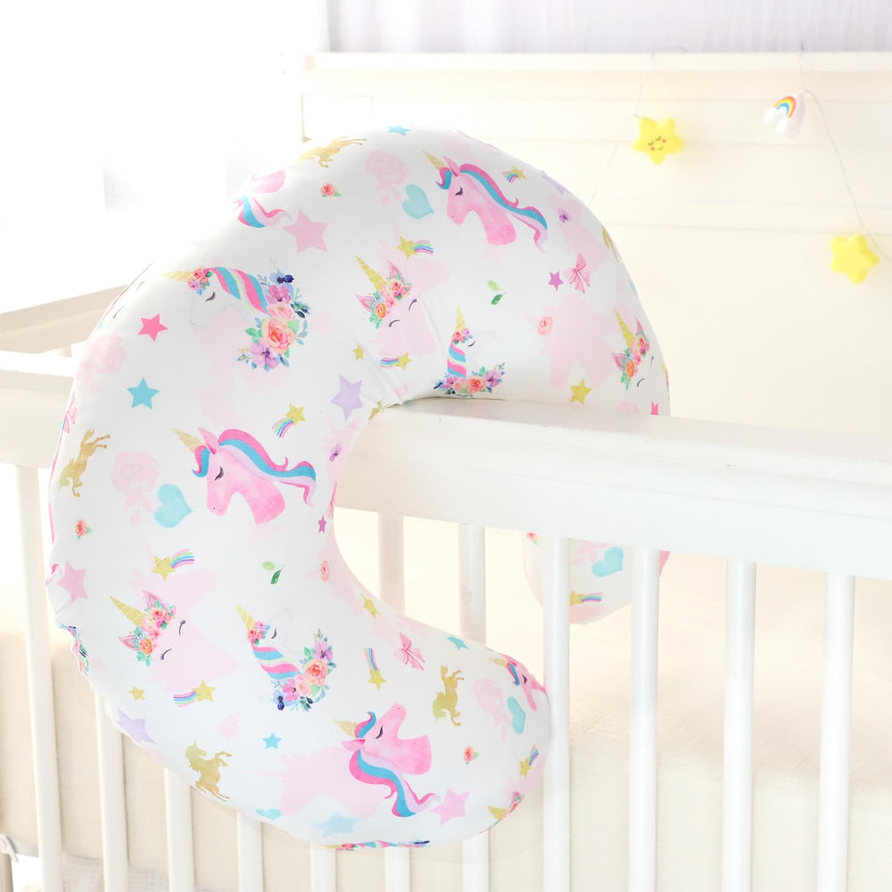 Pea Pod cover provides newborn comfort during feeds and cuddles.