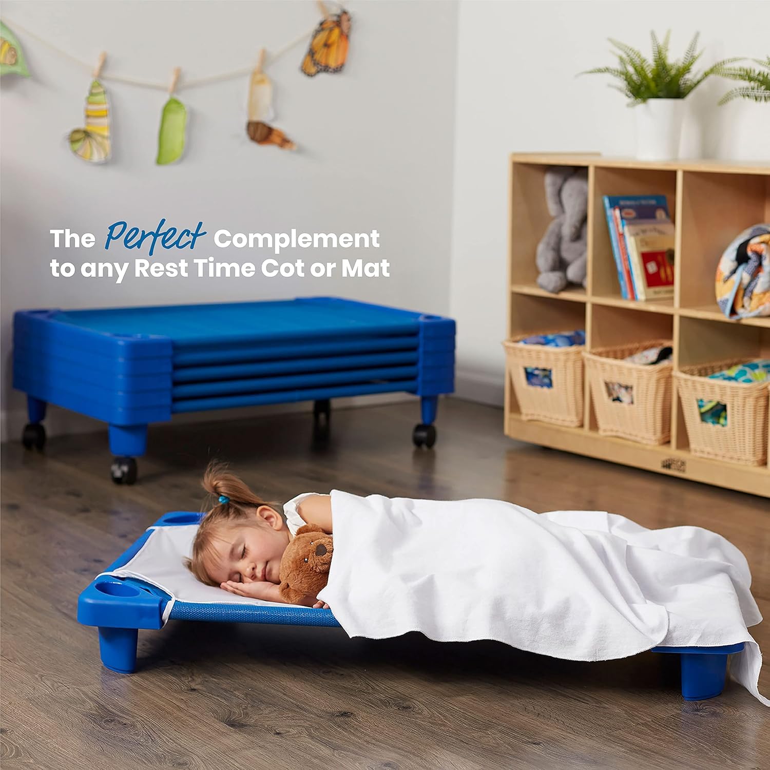 Navy cot sheet by Peace Sleep Bedding adds unisex style to daycare spaces.