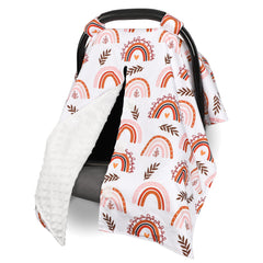 Pea Pod rainbow car seat cover shown on a car seat with a bright rainbow design