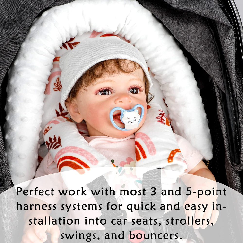 Pea Pod head support used with stroller for cozy on-the-go prestige.