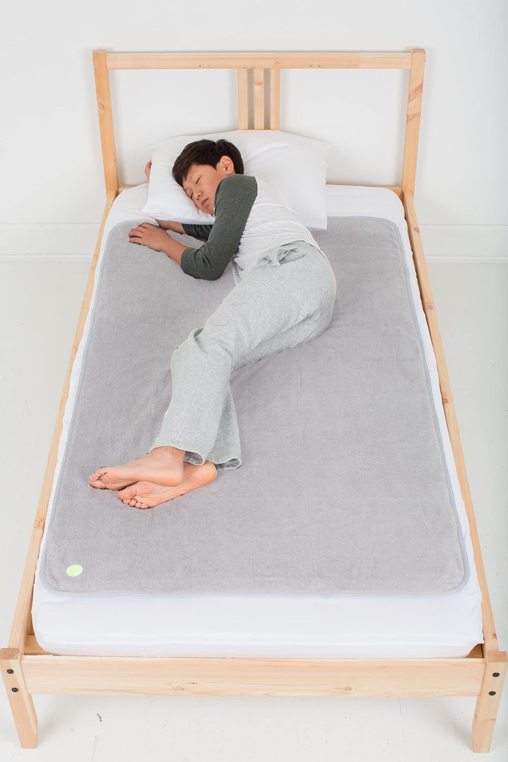 PeapodMats bed mat flat placement for quiet, secure sleep.