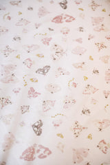 Pehr Daydreamer elasticized bottom demonstrates secure fit on 52x28x8 mattress
