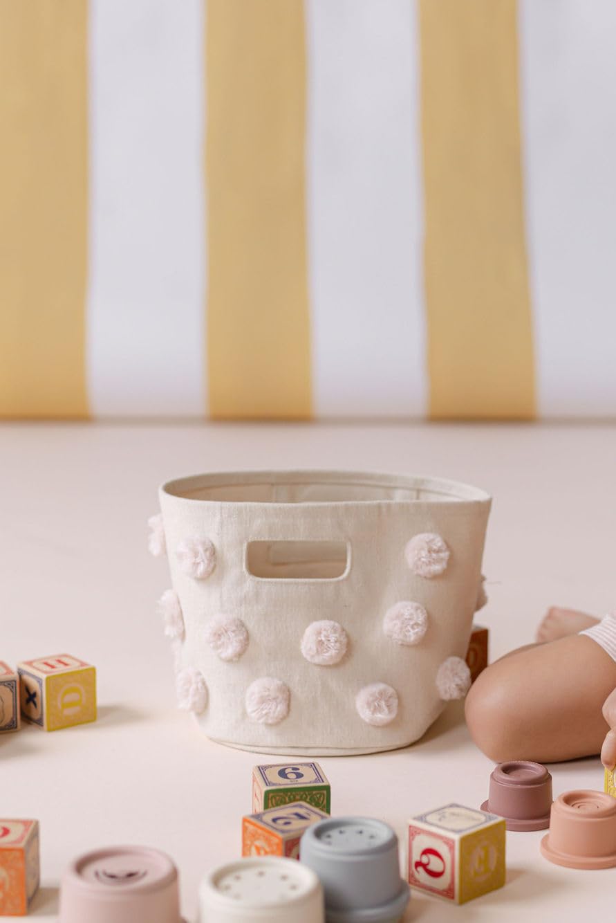 Pehr Pom Pom Basket Mini Blush playroom setup for easy decluttering and charm