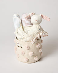 Pehr Pom Pom Basket Mini Blush open lid for quick diaper and book access