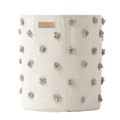 Pehr Pom Pom Hamper in grey for organized storage of clothes and toys.