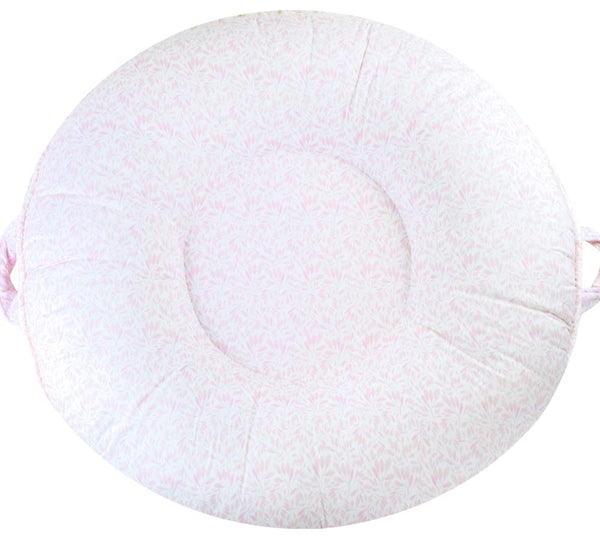 Pello multi-use baby floor pillow with soft center and raised sides for secure lounging
