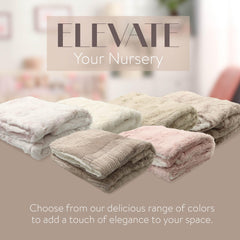 Peluche Lux faux fur baby blanket in cradle, enhances nursery warmth.