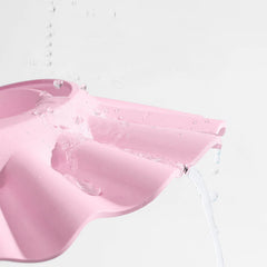 PENINSULA LOVE blue shower cap helps keep water away from ears.