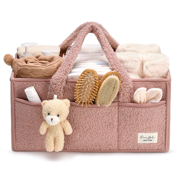 PeraBella baby diaper caddy with handle keeps nursery items organized.