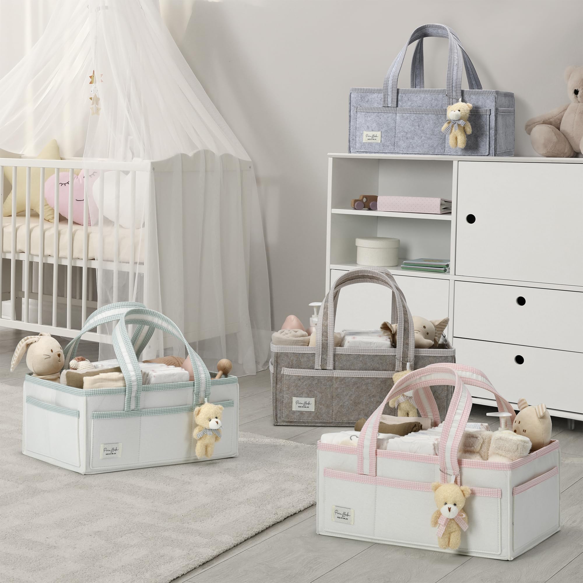 Neutral design suits both newborn girl and boy nurseries.
